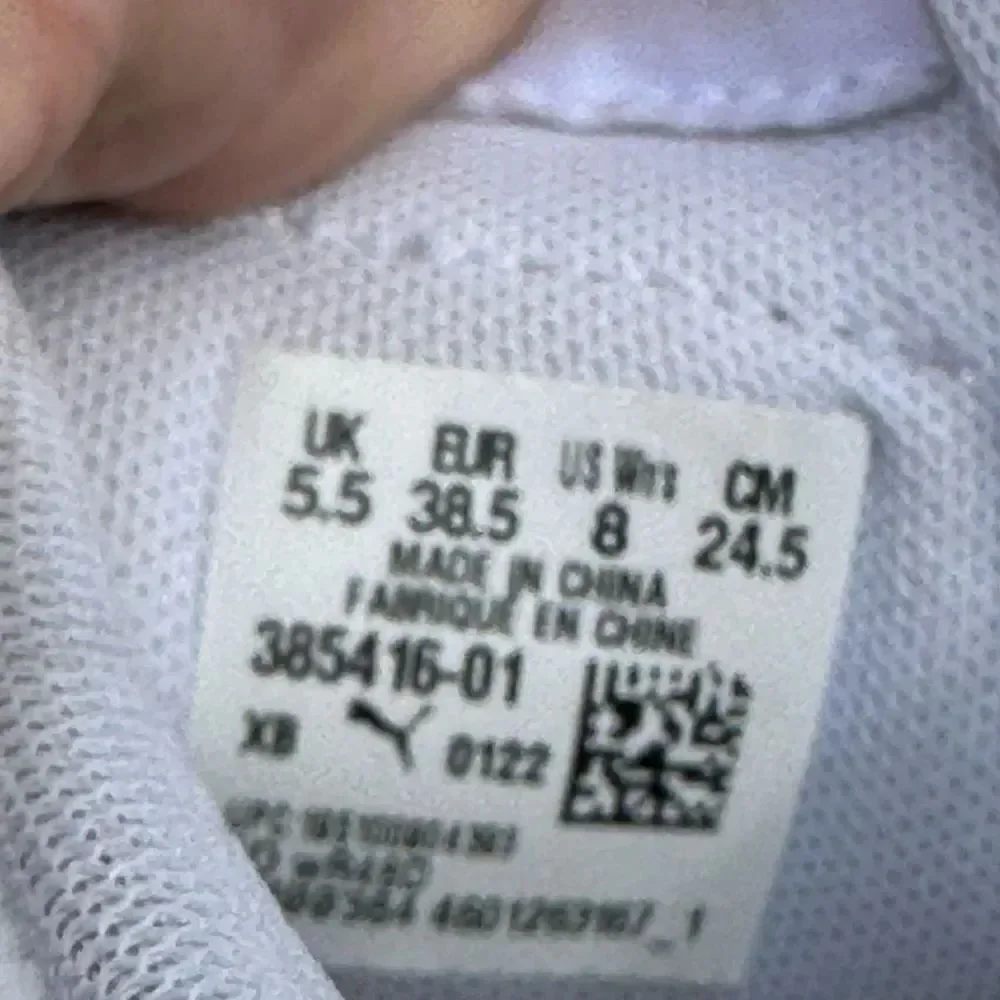 Women's White and Purple Puma Sneakers